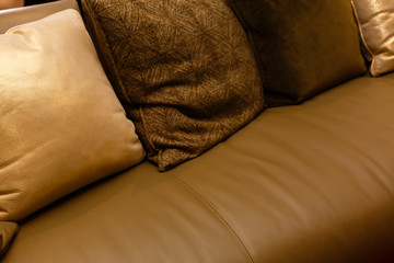 Real brown leather sofa with pair pillows