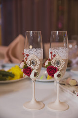 Decoration of the table of the bride and groom for the wedding, Decorated Presidium for the newlyweds