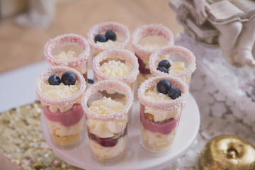 candy bar decoration for the baptism of the child, sweets and handmade pastries