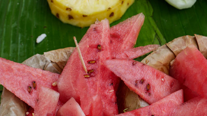Watermelon on banana leaf