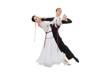 Fototapeta premium ballrom dance couple in a dance pose isolated on white bachground