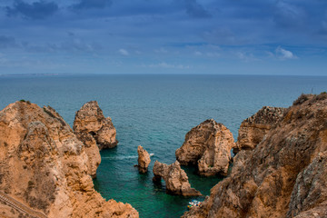 Fototapeta na wymiar Falésias na costa sul do Algarve em Portugal