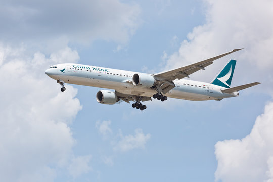Chicago, USA - August 7, 2017: A Boeing 777-300ER of Cathay Pacific Airlines on approach to O'Hare International Airport.