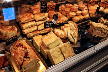 Selection of savoury pastries and pies in a butchers shop © Steve McHale