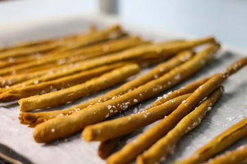 close up of some handmade freshly baked breadsticks