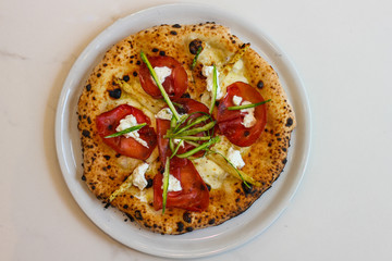 top view of freshly baked pizza with white and green asparagus, bresaola and fresh ricotta - 309277111