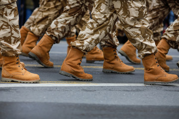 Romanian army soldiers marching during the Romanian National Day military parade.