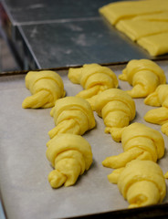 some raw croissants ready to be baked in typical Italian pastries