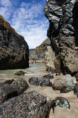 A view through the rocks on a beach