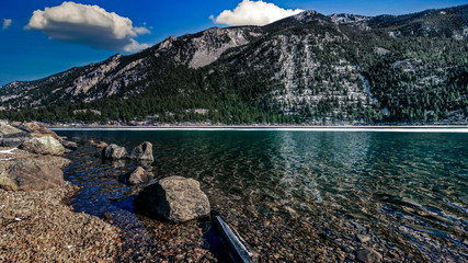 A lake in mountains in Georgetown, Colorado USA off of highway route 70.