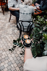 Cup of espresso. Hot fresh coffee drink in black cup. 