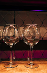 Wine glass standing in bar.