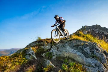 Fotobehang A man is riding enduro bicycle. © Taras