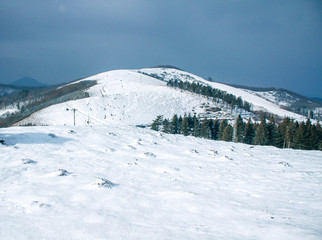 Fototapeta na wymiar Beautiful snowy winter landscape on Mount Bianditz. Basque Country