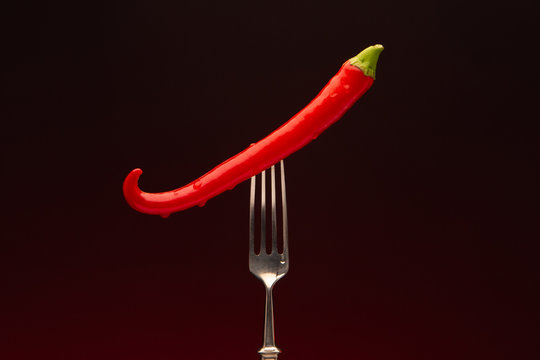 hot pepper on a fork © AlexandrNikitinART
