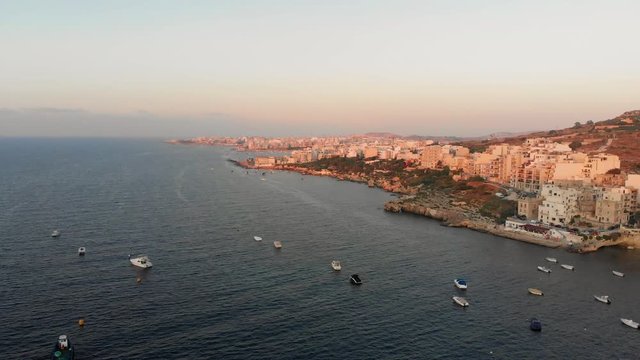 Aerial drone video from Malta, St Pauls' Bay, Xemxija and Bugibba area during sunset. MMXIX.VII.I