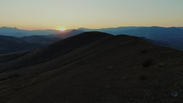AERIAL KOKTEBEL CRIMEA NOVEMBER 2019 Sunset over mountain range