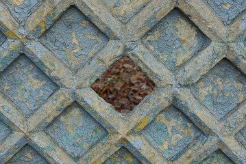 gray blue stone texture from an old concrete wall with a big hole