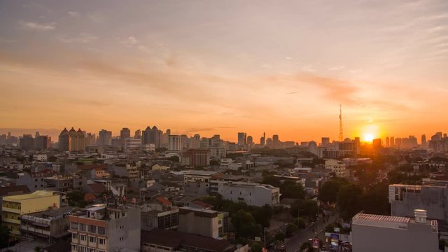 Timelapse of Jakarta city panorama at sunset. Indonesia.