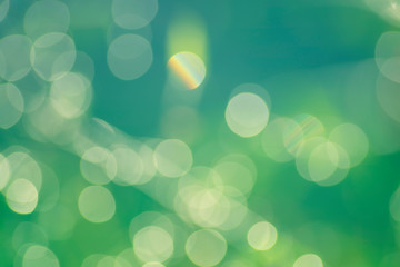 Obraz premium Abstract background The distribution of white bokeh on a light blue background. Trend 2020