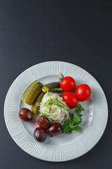 Dishes of traditional Russian cuisine. Restaurant serving. Black background.