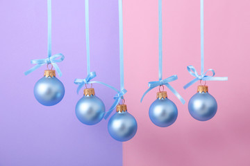 Beautiful Christmas balls on color background