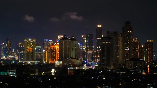 Timelapse of Jakarta city panorama at night. Indonesia.