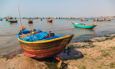 Fototapeta premium Holiday and vacation concept. Tropical beach. fishing boats Vietnam