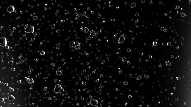Flying Through Bubbles Raising on Black Background in Slow Motion