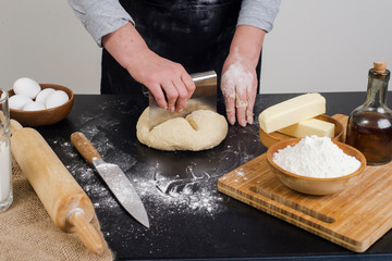 cook kneads dough