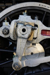 Bangkok,Thailand-December 5, 2019: Driving wheels and coupling rods on a steam locomotive made in Japan