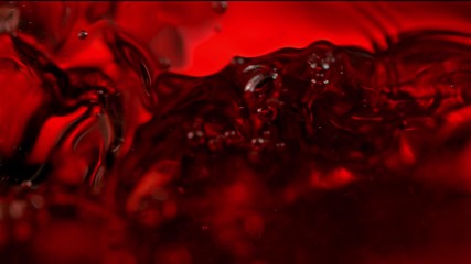 Super Slow Motion Macro Abstract Shot of Swirling Red Wine in Glass at 1000fps. - Powered by Adobe