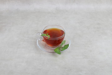  Tea with mint Cup isolated on a white background - white table - red tea