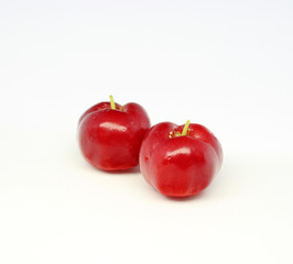Fresh acerola fruit isolated on white