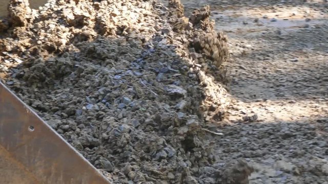 Loader bucket scoops up gravel and dirt - with sound 4K