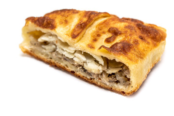 Fried pie with meat of potatoes, on a white background.