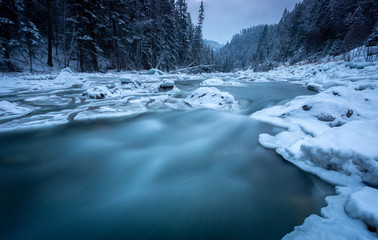 Long exposure of a river in the winter 
