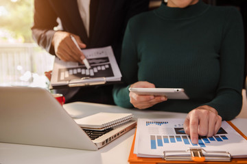 Business team present. professional investor working new start up project. Finance managers meeting.using tablet and laptop and digital tablet computer in modern office.