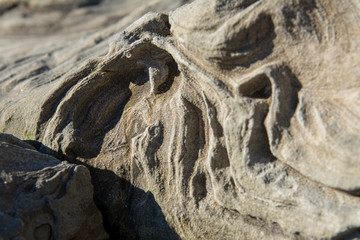 Massive rock outcropping at Bowling ball beach california .