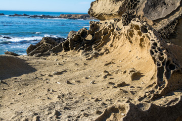 Sandstone cut in odd unique shapes from erosion .
