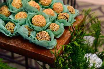  various sweets on the table, chocolate truffles, brigadeiro, chocolate sprinkles, chocolate candy, candy store,  condensed milk candy balls, candy balls