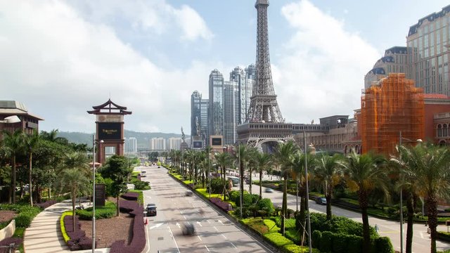 Cotai Macau street traffic cityscape day timelapse pan up