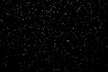 Chaotic white star bokeh on a isolated black background. falling blurry bokeh snow overlay, starry sky. white spots on black background, white drops and spots. abstraction.