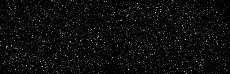 Chaotic white star bokeh on a isolated black background. falling blurry bokeh snow overlay, starry sky. white spots on black background, white drops and spots. abstraction.