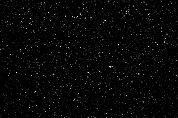 Chaotic white star bokeh on a isolated black background. falling blurry bokeh snow overlay, starry sky. white spots on black background, white drops and spots. abstraction.