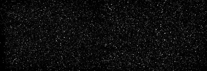 Chaotic white star bokeh on a isolated black background. falling blurry bokeh snow overlay, starry sky. white spots on black background, white drops and spots. abstraction.