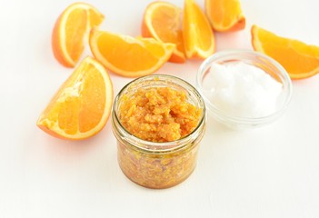 Homemade orange peel, coconut oil and sugar lip or body scrub, natural skin care.