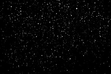 Fototapeta na wymiar Chaotic white star bokeh on a isolated black background. falling blurry bokeh snow overlay, starry sky. white spots on black background, white drops and spots. abstraction.