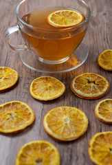 A warm cup of tea with orange and  anise ,herbal tee