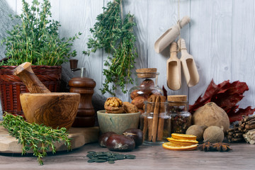 Winter autumn  different ingredients for a warming hot tea  white wood background, copy space, top view